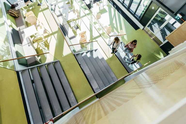 LAB campus staircase with people.